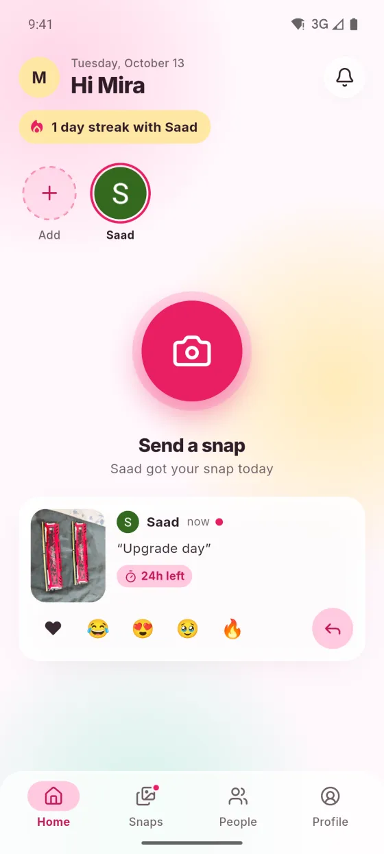 Home tab with a streak and the latest snap from a friend